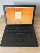 Apple MacBook Black 2006 – Core Duo 2GHz / 2GB RAM – UNIKAT Black