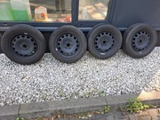 Komplet kół zimowych Bridgestone R16 205/60 92H + kołpaki oryginał VW