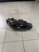 Lampa reflektor scirocco bixenon prawa polift 