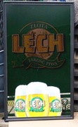 Podświetlana reklama piwa Lech na lustrze