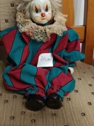 Kolekcjonerska  Lalka porcelanowa 34cm.siedzaca w super stanie