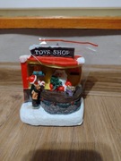 Ozdoba bożonarodzeniowa stoisko z zabawkami Christmas Village 