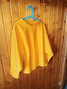 Pomarańczowy sweter dziewczęcy