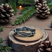 Bransoletka rzemykowa z piórem