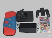Nintendo Switch OLED zestaw etui + gra + grip + ori ładowarka