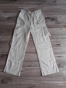 Lniane długie spodnie damskie rozmiar S beżowe proste nogawki na lato 