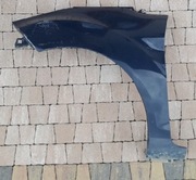 Ford Fiesta MK7 Lift FL Blotnik Lewy Przód Przedni