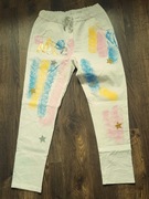 Śliczne spodnie białe malowane 44  48