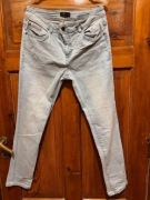 Jeansy męskie Carry 32/32 niebieskie bawełna zwężane z przetarciami