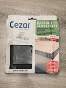 Narożnik zewnętrzny 90st do profilu okapowego OKAP100 Cezar szary
