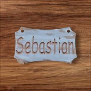 Tabliczka imienna 12cmx7cm "Sebastian"
