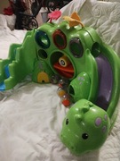 Dzwiekowa duza zabawka,zjezdzalnia pilek Fisher Prica