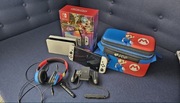 Nintendo Switch oled białe, zestaw +słuchawki +etui Mario Bros