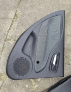 Boczek drzwi tapicerka lewy tył. Fiat Grande Punto 