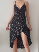 Lekka zwiewna długa letnia sukienka z falbanami midi za kolano w kwiaty