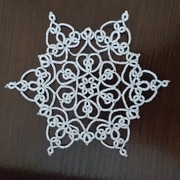 Serwetka frywolitka bialo-sriebna 12 cm