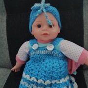 Sprzedam nową sukienkę i opaskę dla lalki ok 35 cm