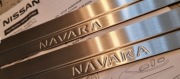 Listwy progowe Nissan NAVARA  - nowe KE9674K400