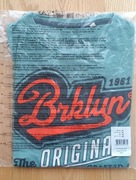 T-shirt niebieski '1961' bawełna C&A r. 158/164