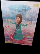 Lalka grająca, jeździ świeci 