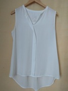 Bluzka biała długa, bez rękawów, tył marszzony