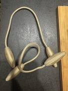 Złote uchwyty do zasłon