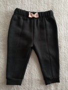 Czarne ocieplane eleganckie spodnie z w kwiatki Firetrap 68 74 80 jak nowe