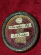 Potrójny relikwiarz, relikwie św. Aleksander i inni