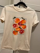 T-shirt z nadrukiem pomarańcze S 100% bawełna