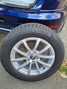 Oryginalne felgi audi i nowe opony zimowe 