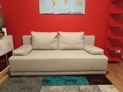 Materiałowa, szara kanapa 