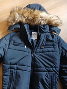 Kurtka męska,pikowana,ocieplana z kapturkiem i liskiem.Czarna.