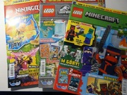 Trzy gazety LEGO z plakatami
