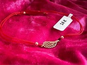 Bransoletka na sznurku z dodatkami złota regulowana pr 585