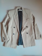 Beżowa dwurzędowa marynarka oversize. Zara.