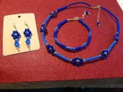 Komplet bizuteri. Kolczyki bransoletka i naszyjnik. 