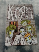 plakat zespołu muzycznego korn