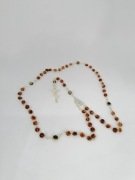 Bursztyn bałtycki różaniec stal posrebrzana