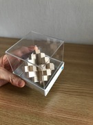 Łamigłówka, układanka logiczna, drewniane klocki. 