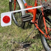 Białe ramię bezpieczeństwa do roweru, chorągiewka Wigry Jubilat, Romet, ZZR