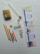 Roman Szmal złoty box kredki akwarelowe stalówki itd