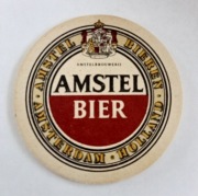 PODSTAWKA POD PIWO  > AMSTEL <  ŚR. 9 CM