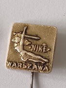 Przypinka PRL Warszawa pomnik Nike 
