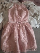 Koronkowa sukienka pudrowy róż z odkrytymi plecami rozmiar XS 