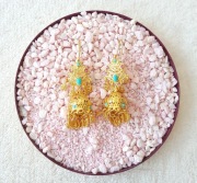 Długie orientalne kolczyki złoty kolor ażurowe Bollywood etno boho hippie