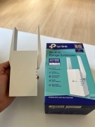 TP-Link RE605X LAN (802.11b/g/n/ax 1800Mb/s) plug repeater