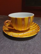 Żółta filiżanka i spodek