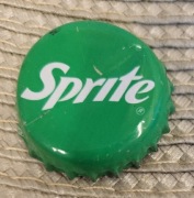 Kapsel Sprite butelkowane