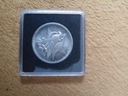 Moneta w  kapslu