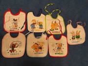 Śliniaki śliniaczki komplet 7 szt podfoliowane dni tygodnia